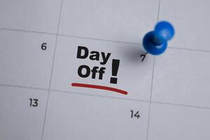 7th day of the month. writing text Day off on calendar date. Save the date. Day of the year concept. photo