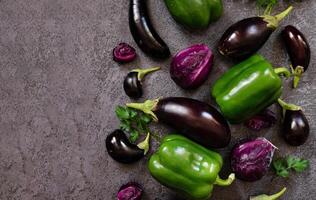 cabbage and eggplant on the background of the old texture. Diet. Healthy eating theme background. View from above photo