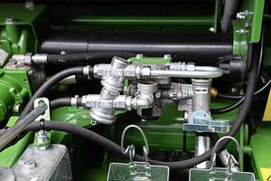 Hoses of modern hydraulic machine. Engineering mmachinery. photo