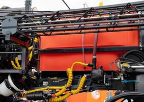 Fragment of yellow diesel engine for electrical generator in power station photo