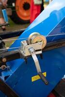 Manual cable winch with hook isolated in white back. photo