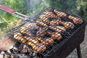 chicken legs grilled close up photo