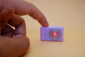 Close-Up of a Toy Camera with Metallic Lens Detail photo
