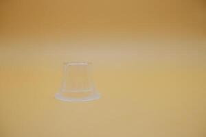 Disposable Plastic Jelly Container Isolated on Plain Surface photo