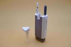 Portable Cleaning Set with Brush, Sponge, and Cleaning Liquid Container photo