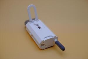 Portable Cleaner for Gadgets Brush Swab, and Spray, in One Tool photo