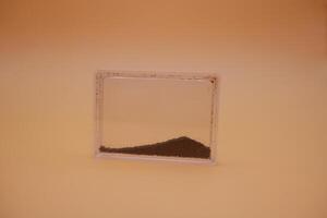 Black Iron Sand Sample in Clear Plastic Case for Mineral Collection photo