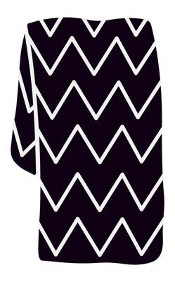 Stylishly folded black and white zig zag patterned scarf, serving as a chic accessory for enhancing any outfit with elegance and warmth during cold weather seasons