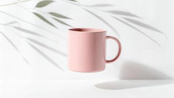 Pink Mug Still Life with Leaf Shadow photo