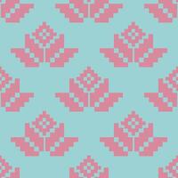 a pattern composed of pixel designs with pink flowers on light blue background , design for fabric or various pattern printing works. vector