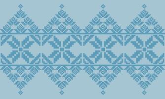 a pattern composed of pixel designs with light blue flowers on light blue background , design for fabric or various pattern printing works. vector