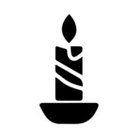 A Simple Black Silhouette Image of a Lit Candle on a Plate vector