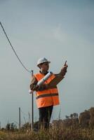 Engineer In The Nature Looking At The Building To Remake photo