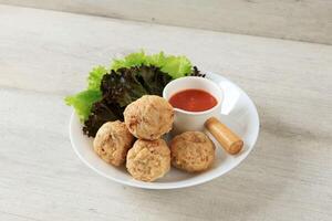Bakso Goreng or Deep Fried Meatball. Made from Chicken, Meat, or Shrimp with Flour. photo