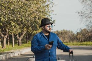 Man Using The Smartphone During A Trip photo
