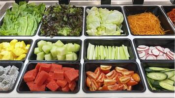 Fresh Vegetable and Fruit Salad Bar Display also included melon, watermelon, tomatoes, celery, beetroot, cabbage, pineapple, dragon fruit, carrot, cucumber photo