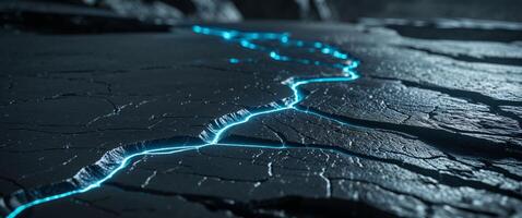 A blue light is shining on the ground photo