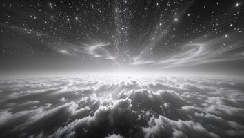 A black and white photo of the sky and clouds