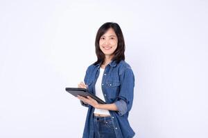 Southeast asian woman is small business owner working creatively in retail and online store startup industry, happily managing her shopping and business tasks photo