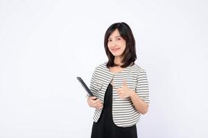 Southeast asian woman shows thumbs up while holding folder representing small business owner in retail and online store startup industry with creative ideas photo