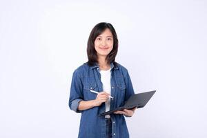 Southeast asian woman small business owner is creatively working on her online store using laptop in retail and startup industry with confident and happy expression photo