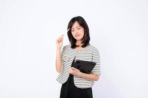 Southeast asian woman is small business owner thinking creatively about her retail startup using online store in creative industry for shopping success and growth photo