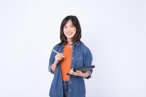 Southeast asian woman small business owner is creatively working on her online store using digital tablet in retail and startup industry with bright and confident smile photo