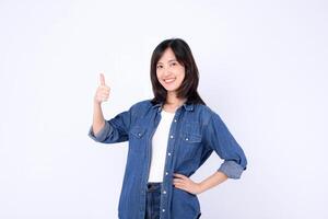 Southeast Asian woman in casual denim shirt smiling and showing thumbs up gesture with confidence and positivity on white background photo