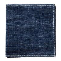 Detailed texture of indigo fabric piece with stitched border creating a square shape photo
