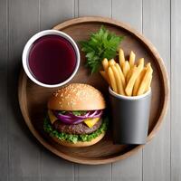 Delicious Cheeseburger French Fries and Drink on Wooden Tray Overhead View photo