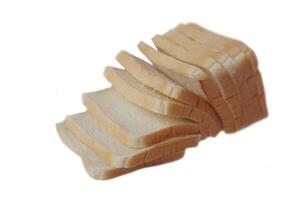 Loaf of homemade slide soft bread isolated on white background. Concept, food for breakfast. Concopt, fresh, fluffy bread is perfect for a delicious breakfast. photo