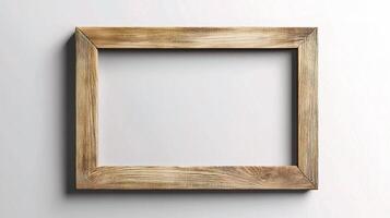 A wooden frame on a white wall photo