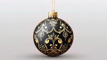 A black and gold ornament hanging from a string photo