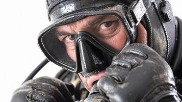 A man wearing a scuba mask and gloves photo