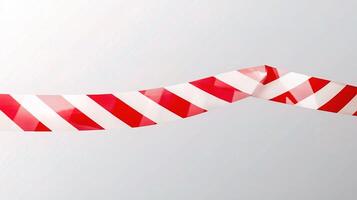 A red and white striped ribbon on a white background photo