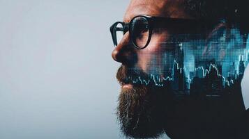 A man with glasses and a beard is looking at a stock chart photo