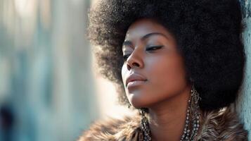 A woman with an afro wearing a fur coat photo