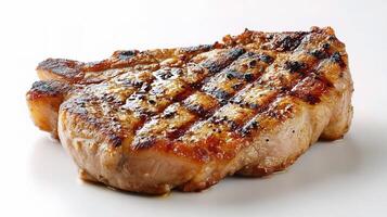 A piece of meat on a white surface photo