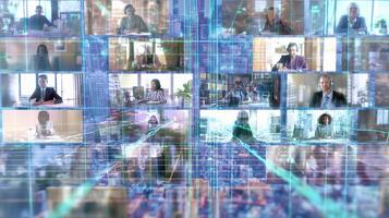 Business people in a conference room with many screens photo