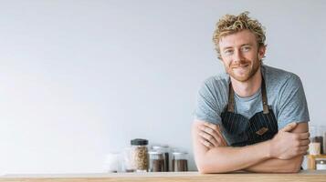 A man with a beard sitting at a table photo