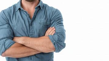 A man with his arms crossed standing with his hands on his chest photo