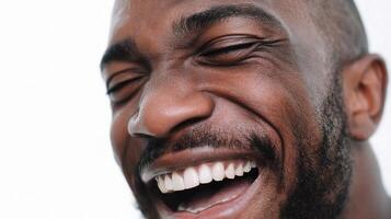 A man laughing with his mouth open photo