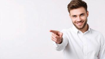 A man in a white shirt pointing at something photo