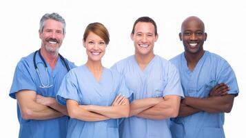 A group of doctors and nurses standing together photo