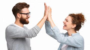 A man and woman giving each other high five photo