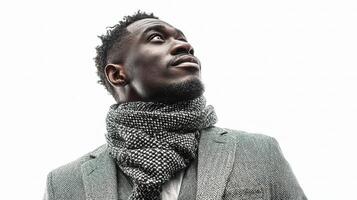 A man wearing a scarf and a suit jacket photo