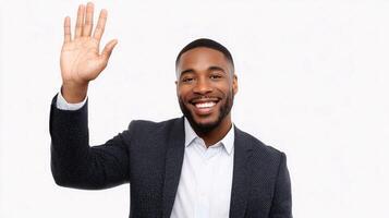 A smiling black man waving his hand photo