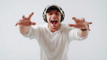 A man wearing headphones and screaming photo