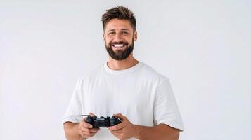 A man with a beard holding a game controller photo