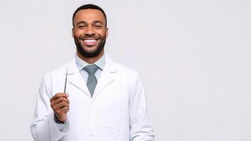A smiling black man in a lab coat photo